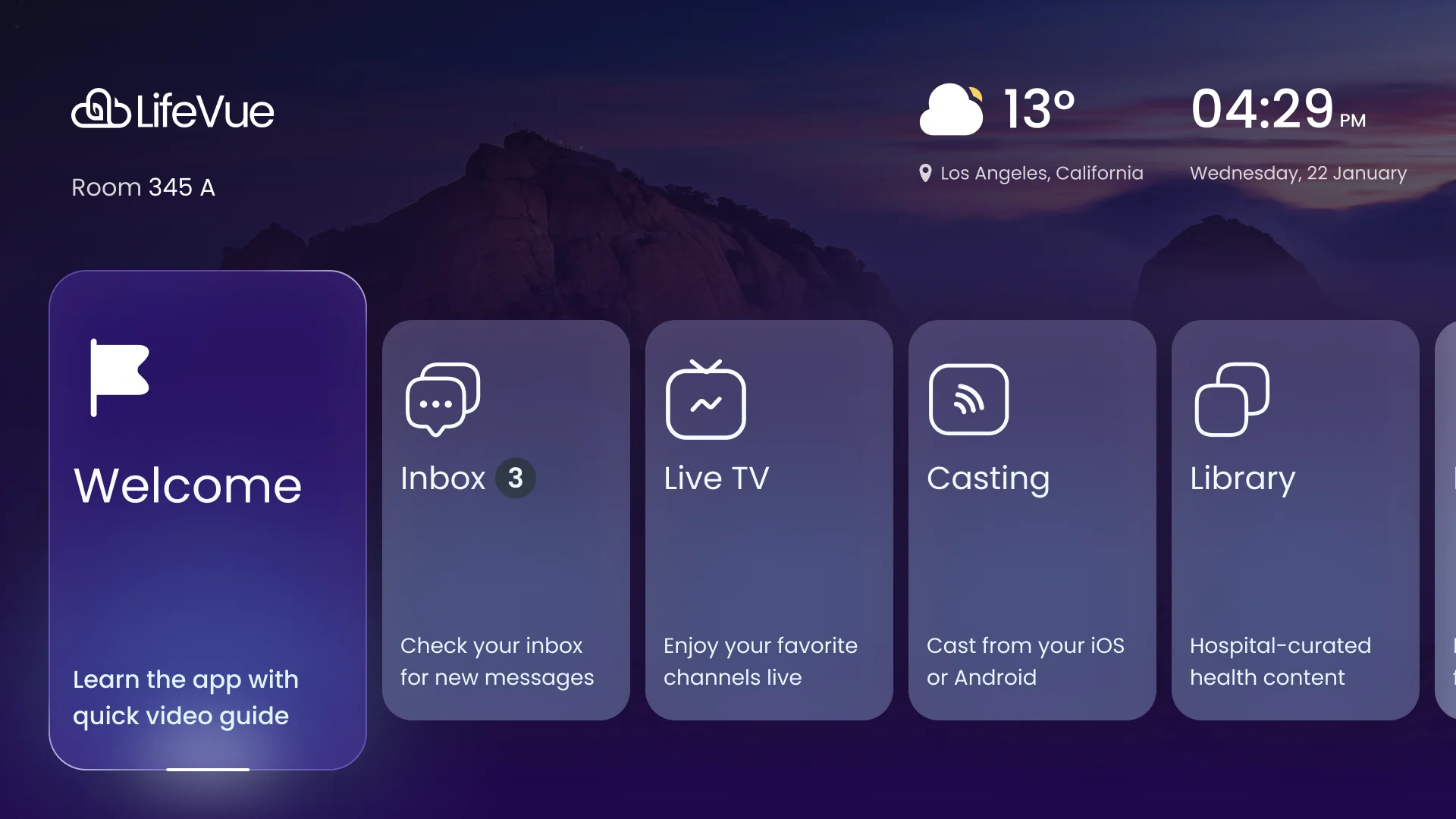 LifeVue adult home hub: a purple evening scene with the Welcome card in focus