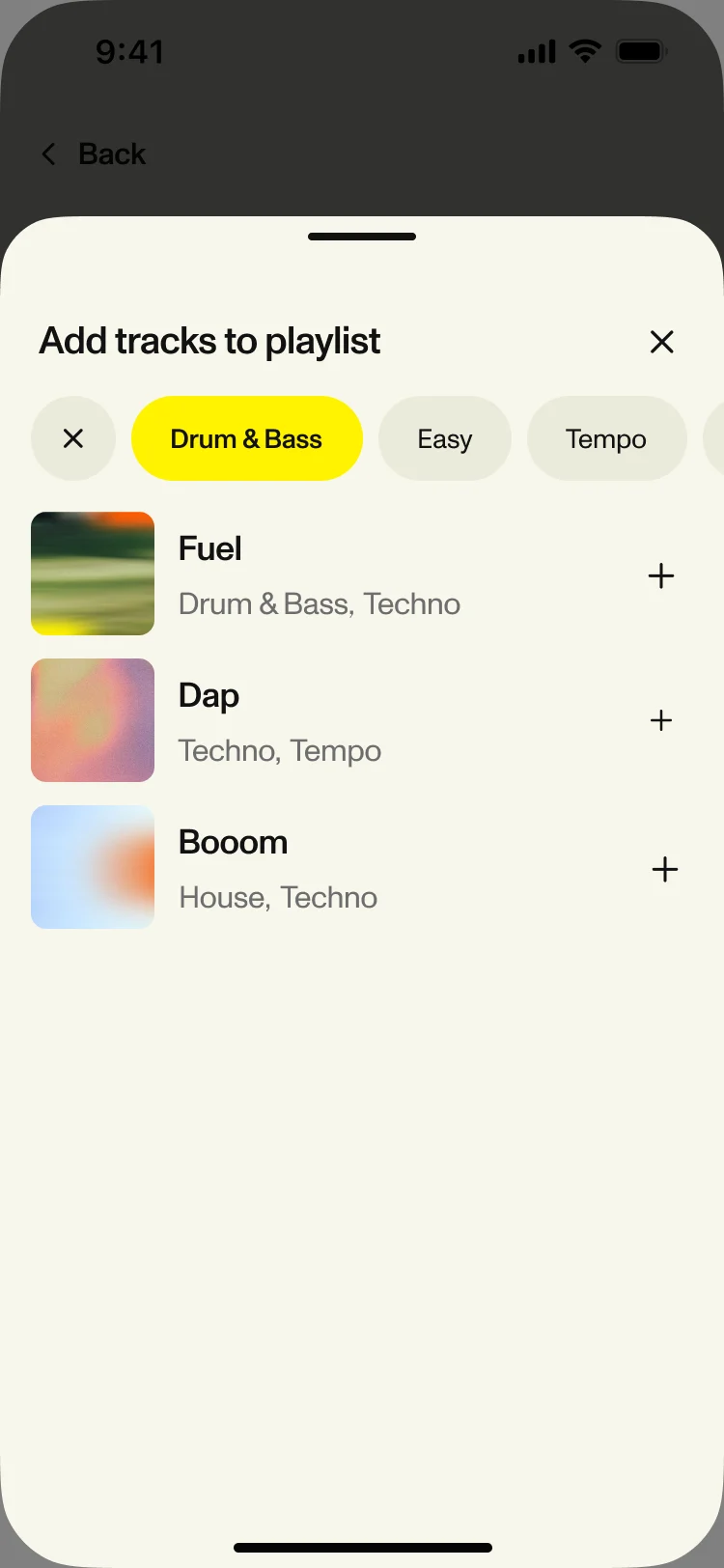Add tracks to playlist: Drum & Bass selected among the filter chips, with Fuel, Dap and Booom to add