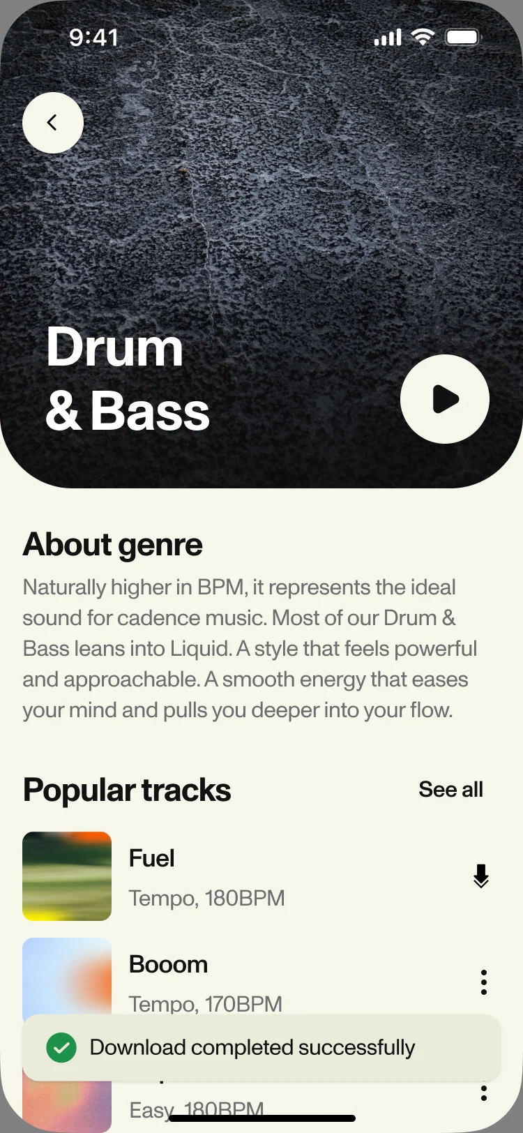 Drum & Bass genre page with the toast Download completed successfully