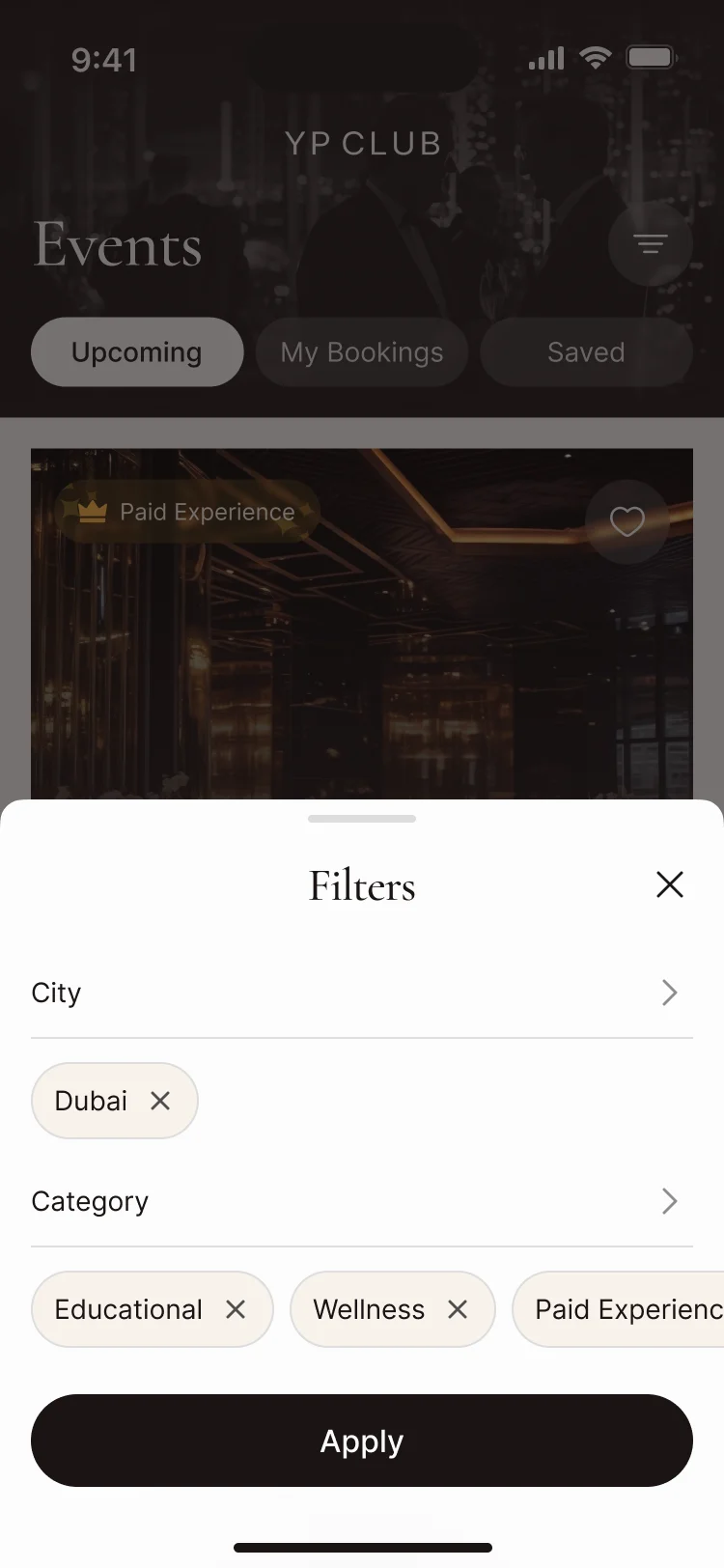 Event filters: Dubai selected as the city, and Educational, Wellness and Paid Experience as categories, with Apply