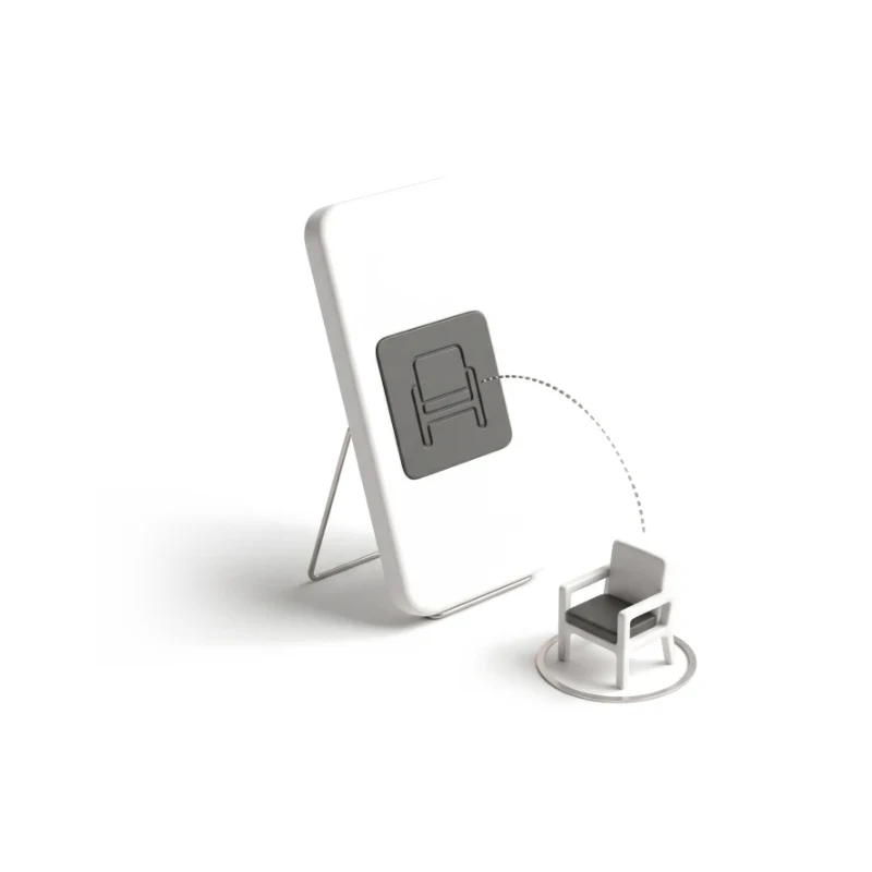 A ceramic phone showing an armchair card, the same armchair standing in front of it on a steel ring, a steel arc joining the two.