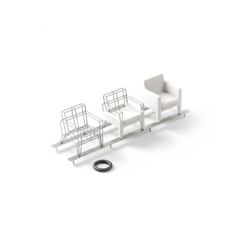 Three armchair models on a steel rail, from a steel wireframe to half built to solid ceramic, a graphite loading ring in front.