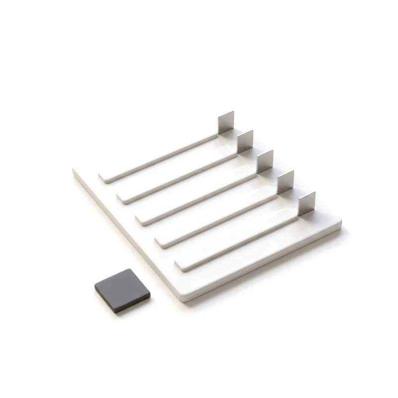 A white ceramic tablet with five raised list rows, a small steel check tab at the end of each, and a graphite stamp beside it.