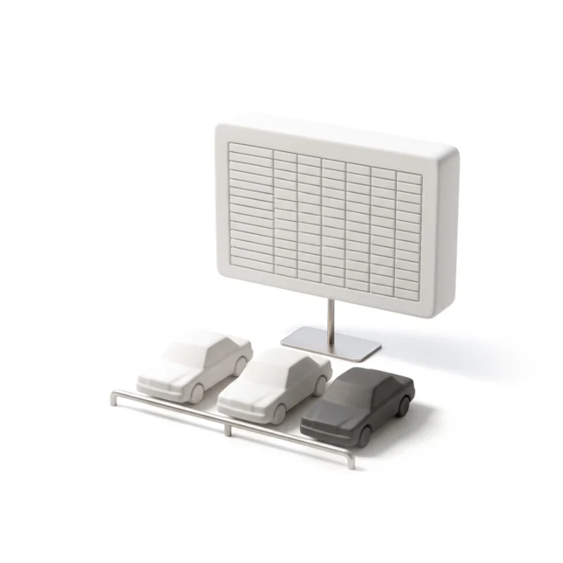 A ceramic monitor with a dense table, three small cars on a steel rail in front, one car in graphite.