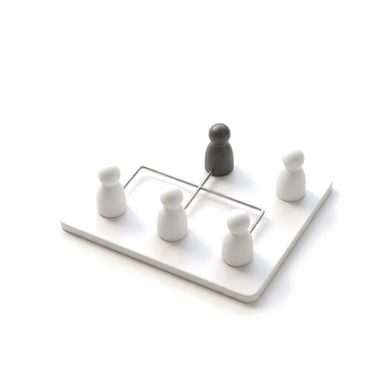White ceramic figure tokens on a base plate joined by thin steel rods, one token in graphite.
