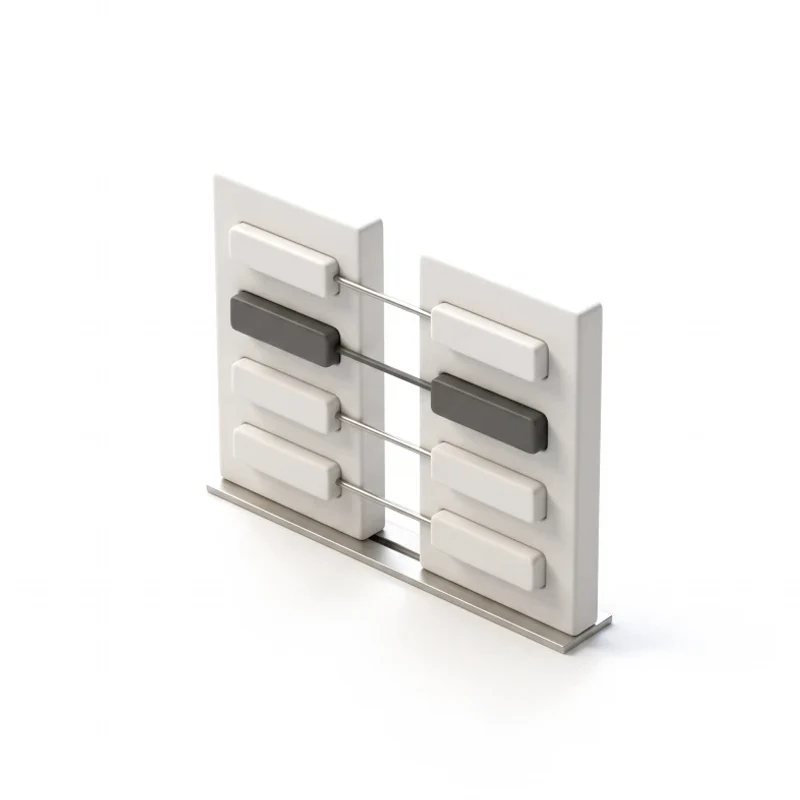 Two ceramic cards side by side on a steel rail, matching rows joined by steel bars, one pair of rows in graphite.
