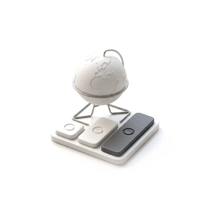 A small ceramic globe on a steel stand, three button tiles of different lengths in front, the longest in graphite.