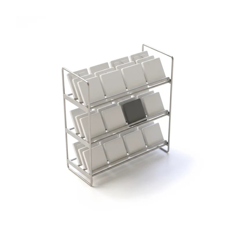 A thin steel rack of three shelves holding rows of white ceramic tiles like covers, one tile in graphite.
