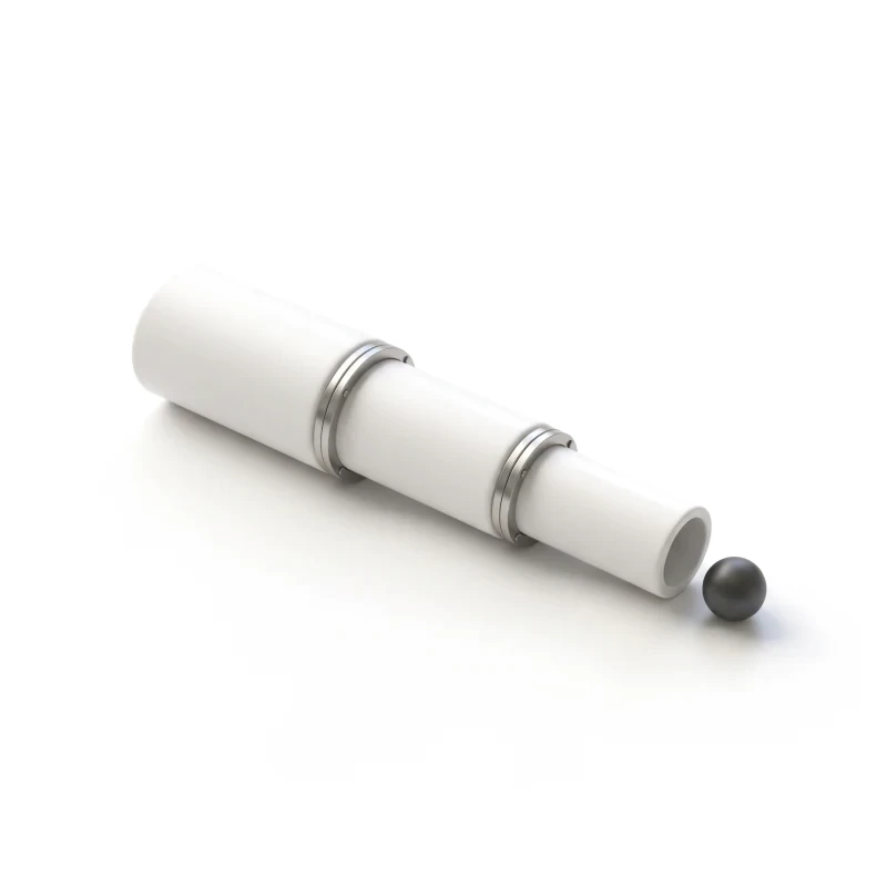 Three ceramic pipe segments narrowing in a line, joined by steel couplings, a graphite ball rolling out of the narrow end.