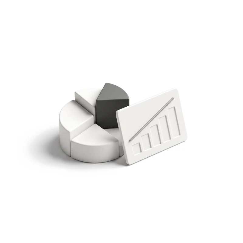A ceramic donut-chart puck with one graphite segment beside a ceramic tile carved with a rising bar chart.