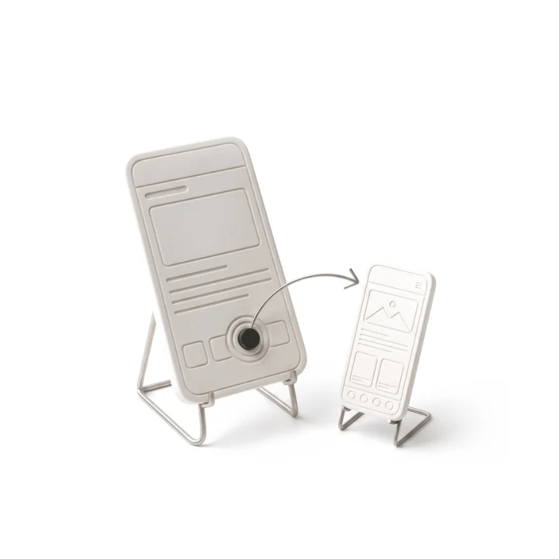 A ceramic wireframe phone on a steel stand with a graphite tap point, a steel arrow leading to the next screen standing beside it.