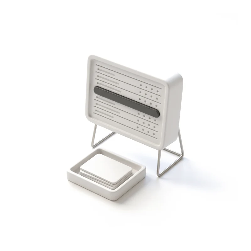 A ceramic monitor on a steel stand showing a carved table of rows, one of them raised in graphite, with a tray of cards in front.