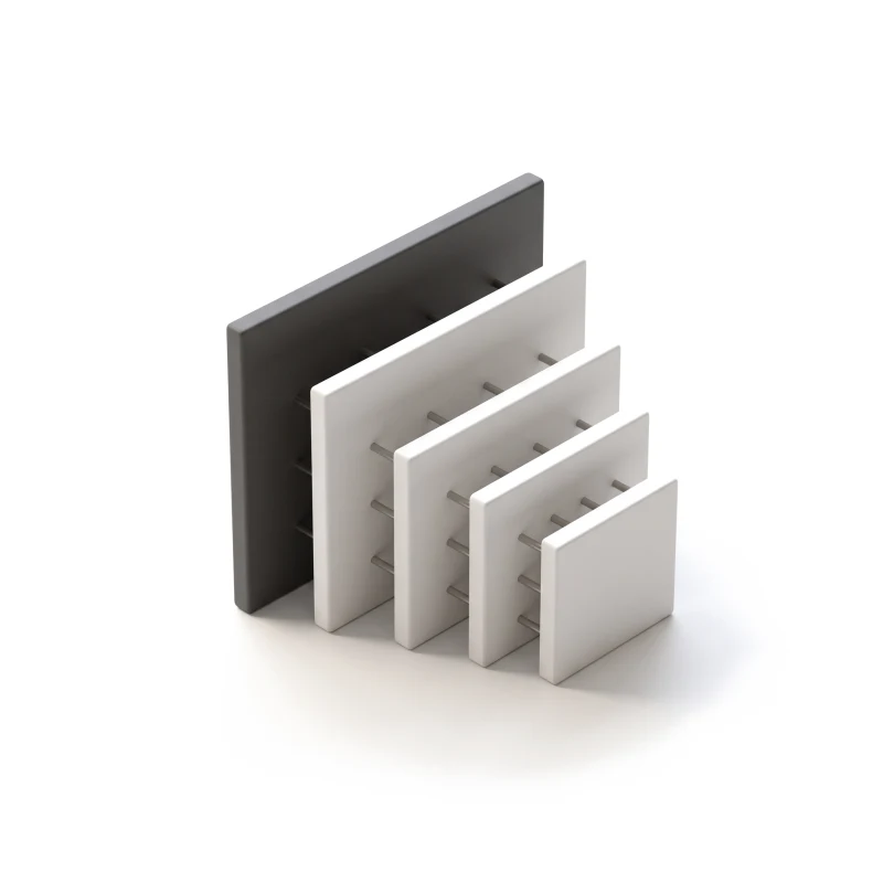 Five white ceramic slabs in a row from largest to smallest, the largest in graphite, spaced evenly by steel pins.